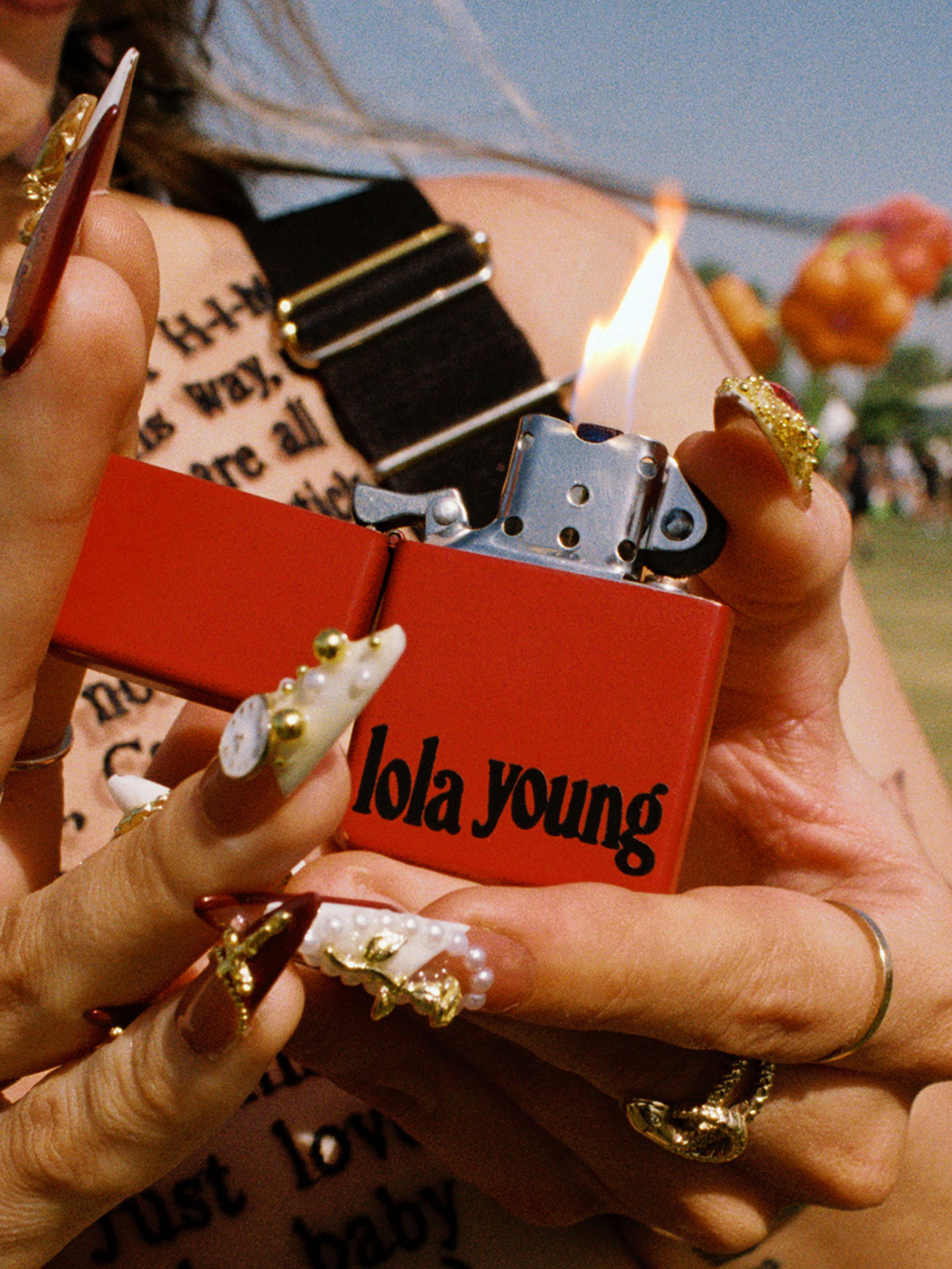 Lola Young - lola young red flip lighter